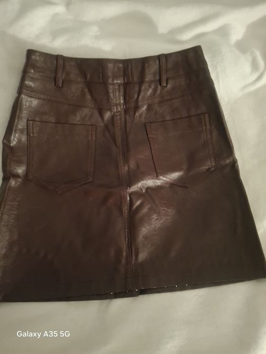 Спідниця,колір бордовий.