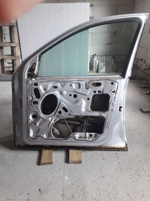 Двері Форд Фокус МК 1 хетчбек