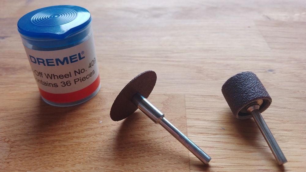2 Trzpienie + tarcze Dremel 409 + rolka Dremel 432