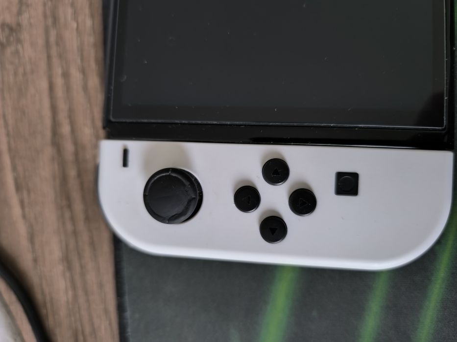 Nintendo Switch 1 OLED + dock + etui + adapter na joypady