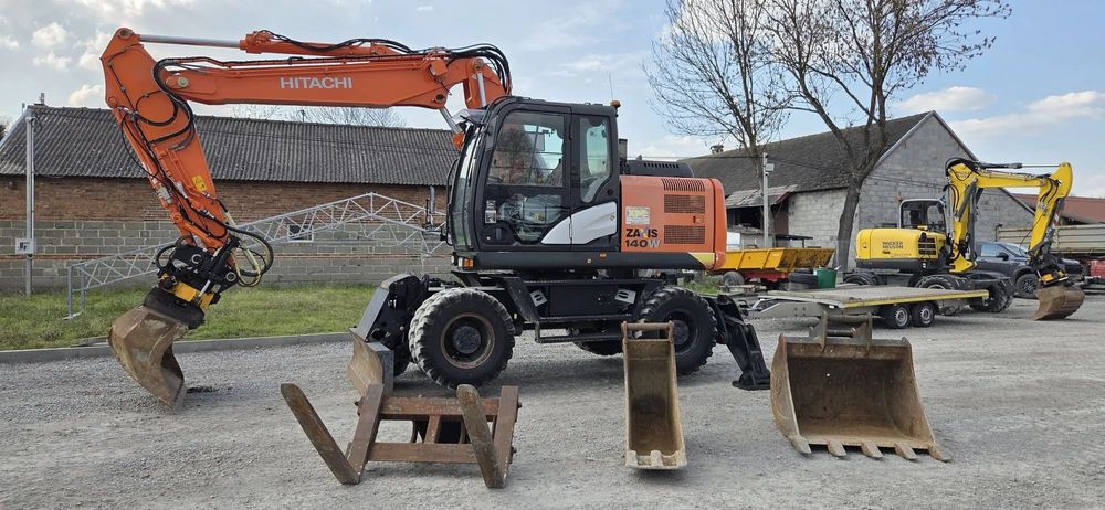 Hitachi HITACHI ZAXIS 140W-5B + ENGCON+ Osprzęt  Hitachi Zaxis 140W-5B + Engcon+ Osprzęt Koparka kołowa