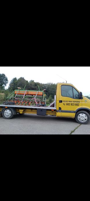 Pomoc Drogowa \ Autolaweta 24H/7 /, oraz usługi Minikoparką.