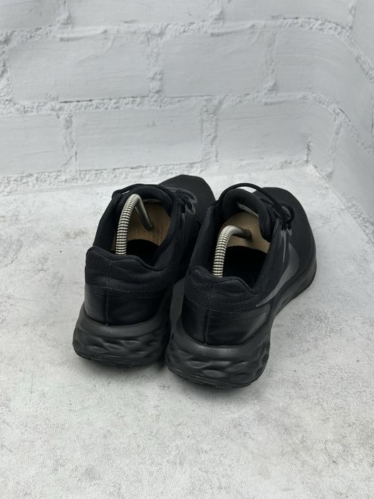 Чоловічі чорні спортивні кросівки Nike Revolution 42.5p