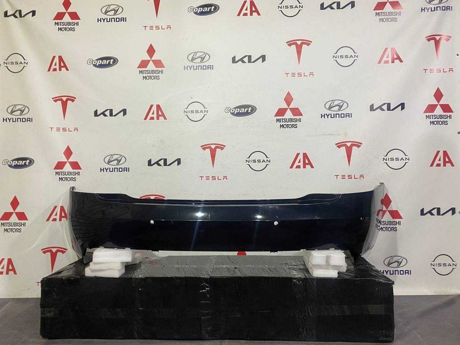Бампер задній  Tesla Model S Rest 1057319-00-b