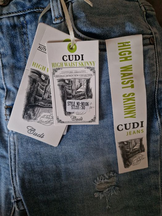 Spodnie damskie jeansowe z przetarciami Cudi Nowe