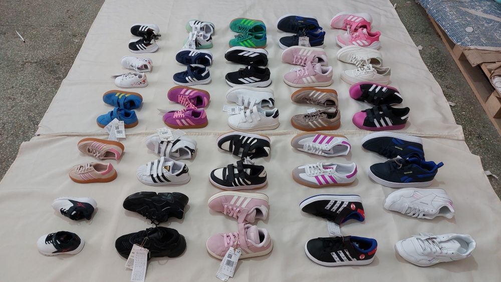 Дитяче взуття Adidas Reebok  оптом сток