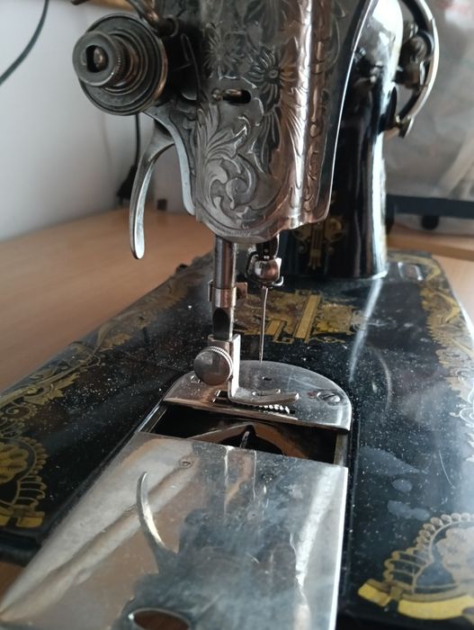 Máquina costura antiga da Singer
