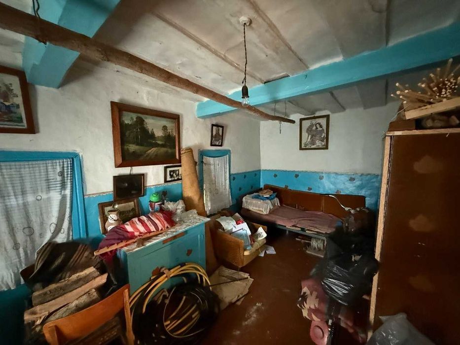 Одноповерховий будинок. 20км до центру міста. Ділянка 21 сотка. Житловий стан.