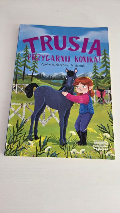 Książka „Trusia. Przygarnij konika” autorstwa Agnieszki Nożyńskiej-Demianiuk.