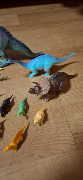Игрушки динозавры фигурки