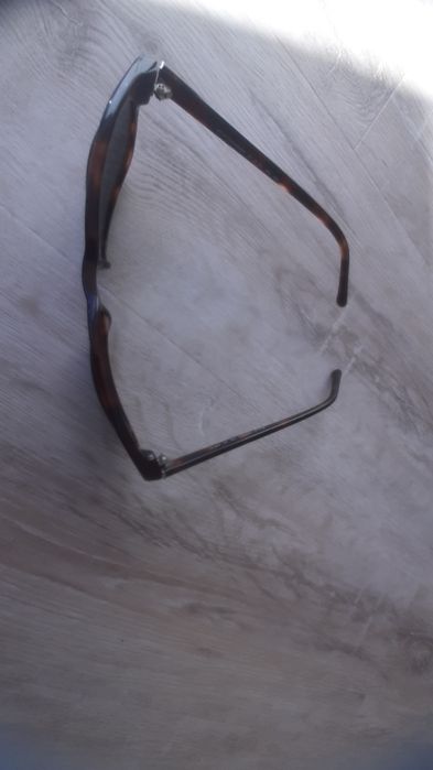 Óculos de sol castanhos