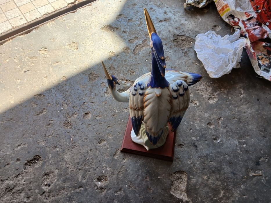 passarinho em porcelana