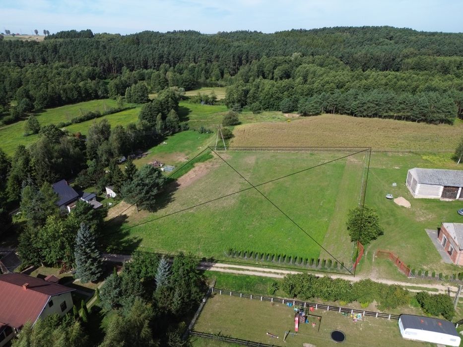 Działka 4000 m² z WZ | Rzeka Wel 100 m | Jezioro 400 m | Ogrodzona