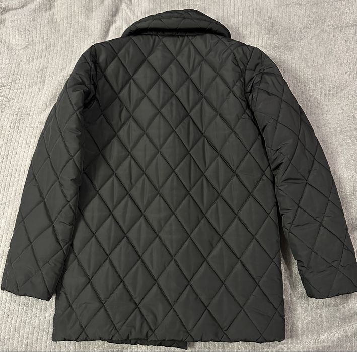 Стильний пуховик під пояс