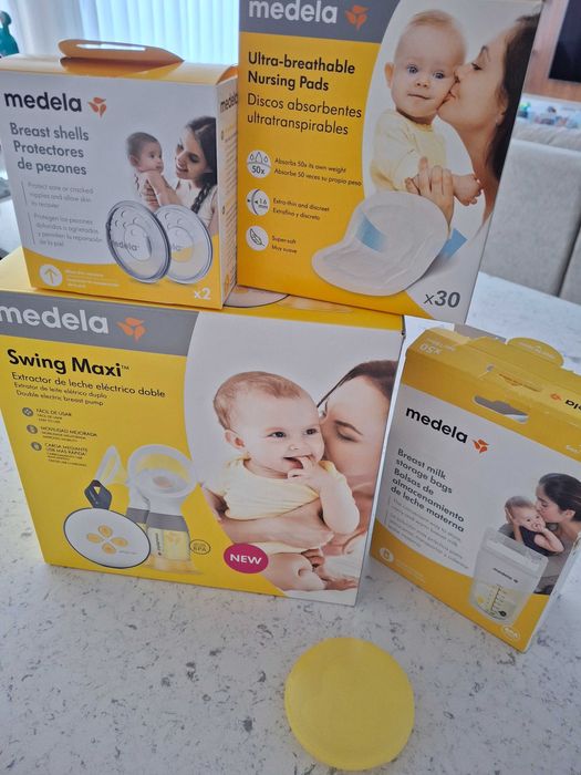 Máquina extratora de leite dupla Medela + acessórios