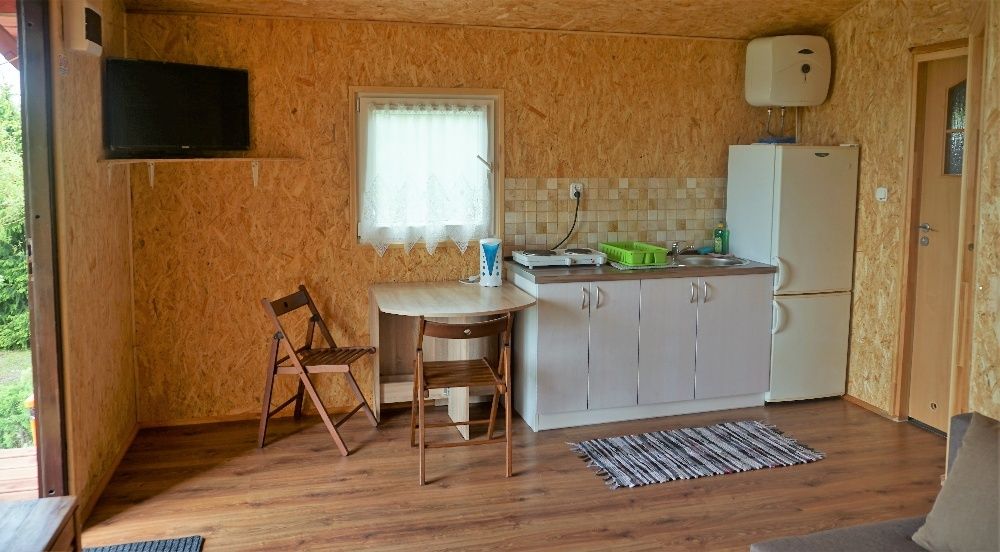 Domki i pokoje do wynajęcia Mikołajki