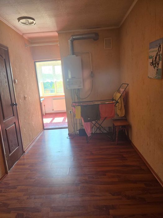 Продається 2-кімнатна квартира з ділянкою, гаражем та господарськими будівлями (м. Гайсин)