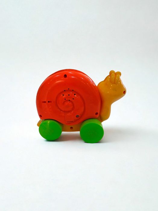 Brinquedo caracol musical