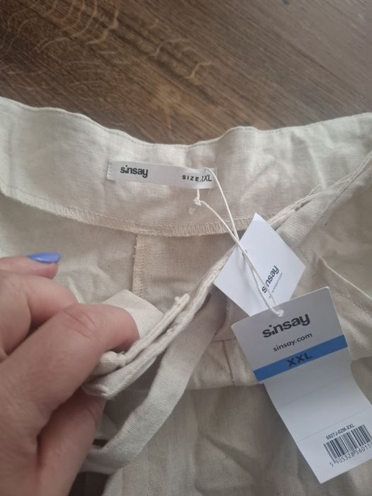 Nowe spodenki krótkie beżowe XXL