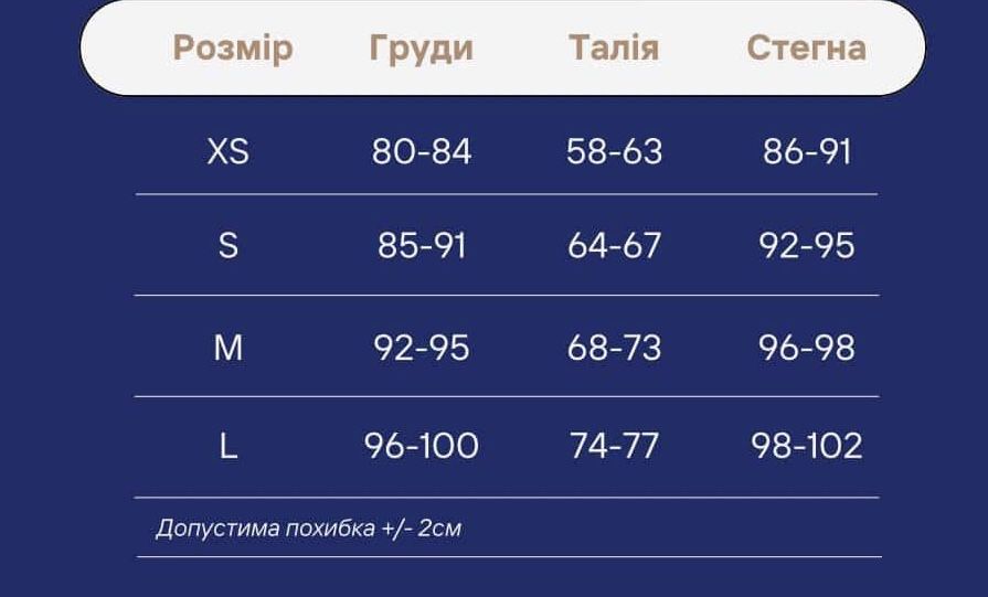 Вишукана сукня чорного кольору в паєтку та стрази