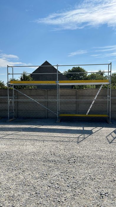 Nowe rusztowanie elewacyjne stalowe  budowlane typ BOSTA 8,3 m x 9 m =  74,7 m2