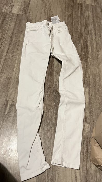 elastyczne spodnie damskie. zara rurki 34 xs biale