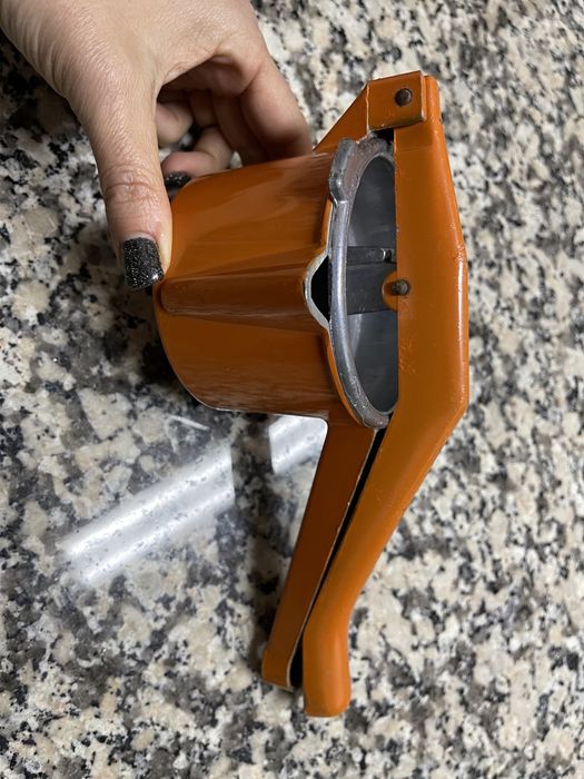 Espremedor de fruta antigo