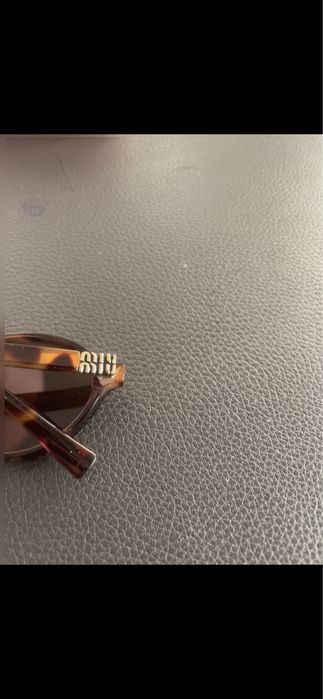 oculos miu miu muito bom estado