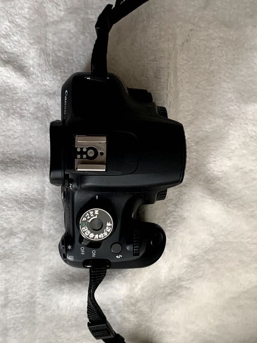 Canon 1200D + 4 batteries + charger + SD card + bag64551894400643123