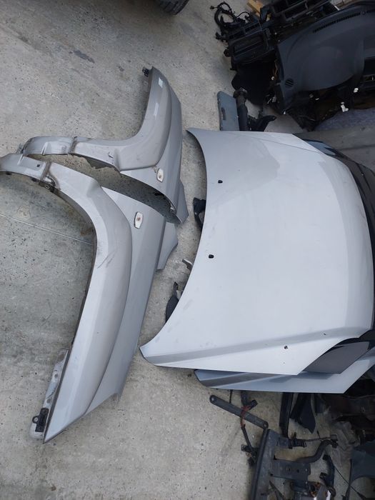 Капот Kia Sportage 2. Кіа спортейдж2Туксон