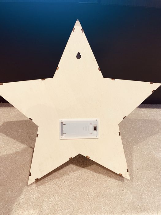 Estrela de Natal em madeira com luz