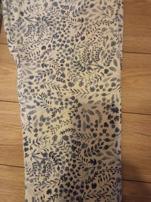 Spodnie damskie białe w niebieski wzór. 42/44