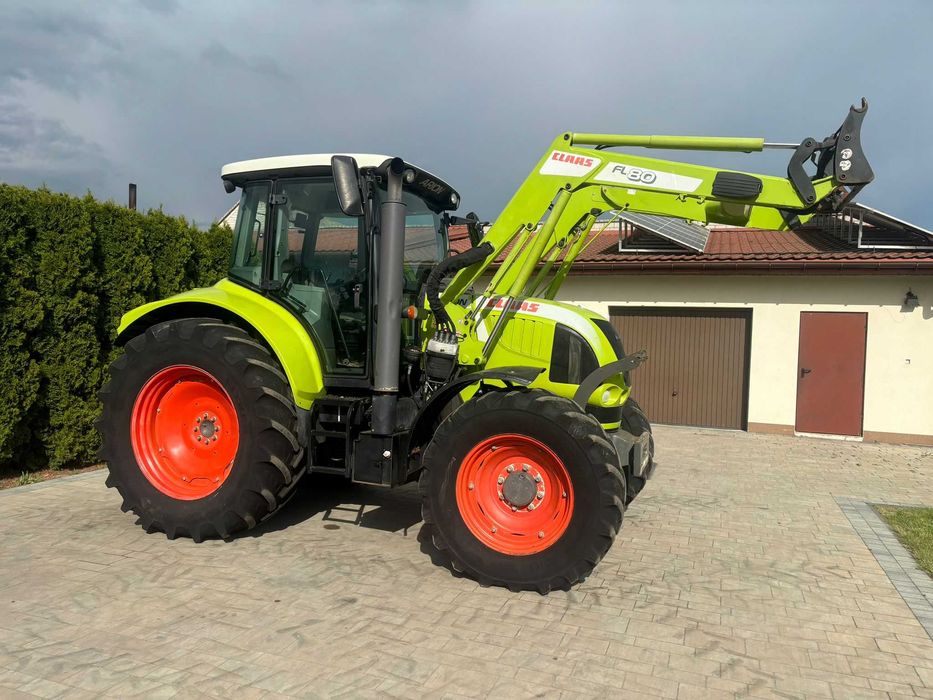 Claas Arion 510 z ładowaczem