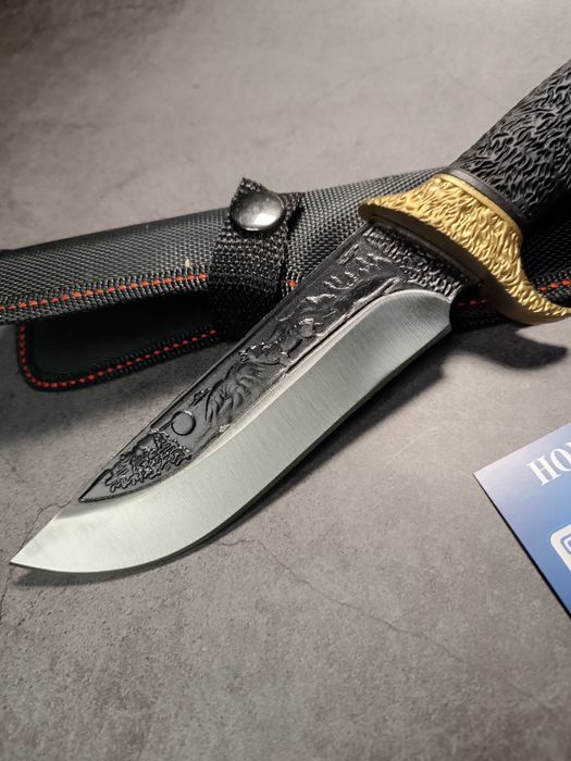 Эксклюзивный охотничий нож "Волк" в золоте