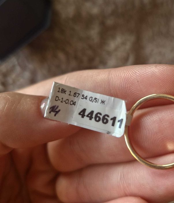 nowy złoty (750) pierścionek z brylantem (1,65g)