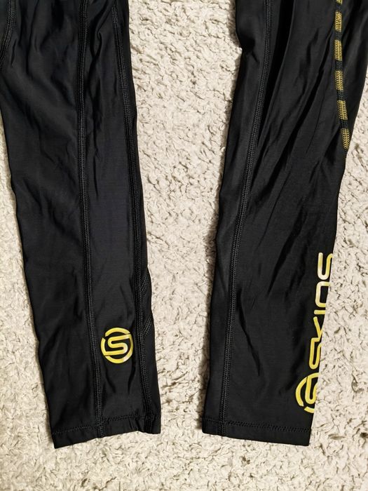 Spodnie legginsy Skins sportowe kompresyjne funkcyjne