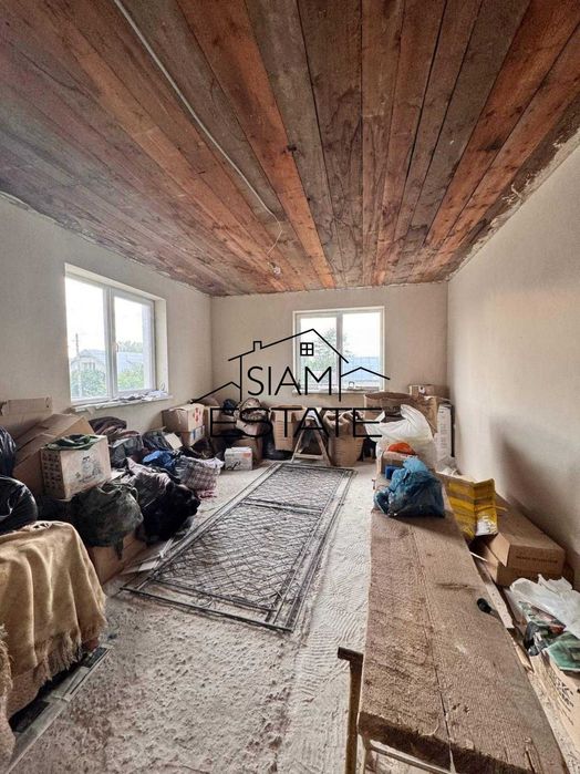 Продається малий житловий будинок з новим недобудованим будинком