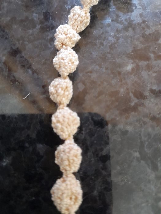 Terço em renda feito à mão