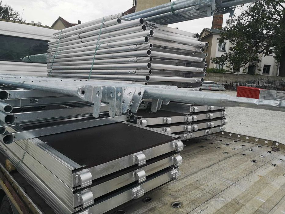 Lekkie aluminiowe rusztowanie Baumann 6,3X12,28=77m2 podesty 3,07m