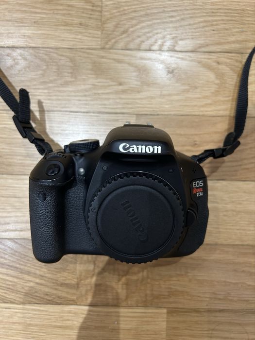 Canon EOS Rebel T3i + uma objetiva + filtros + saco