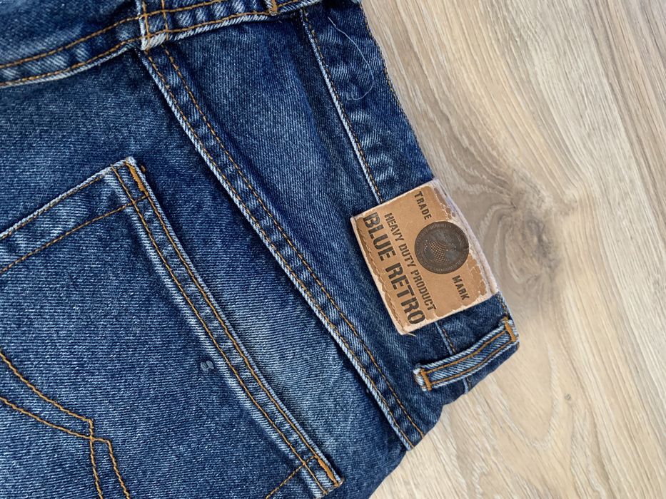 Широкі сині джинси