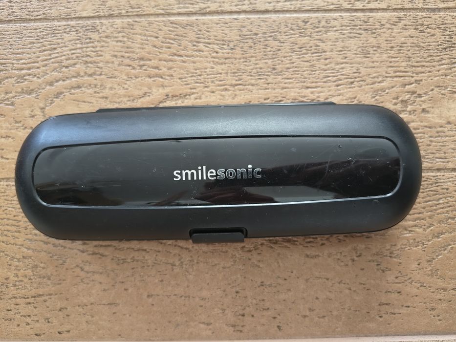 Szczoteczka soniczna smilesonic (nie działa), etui, ładowarka