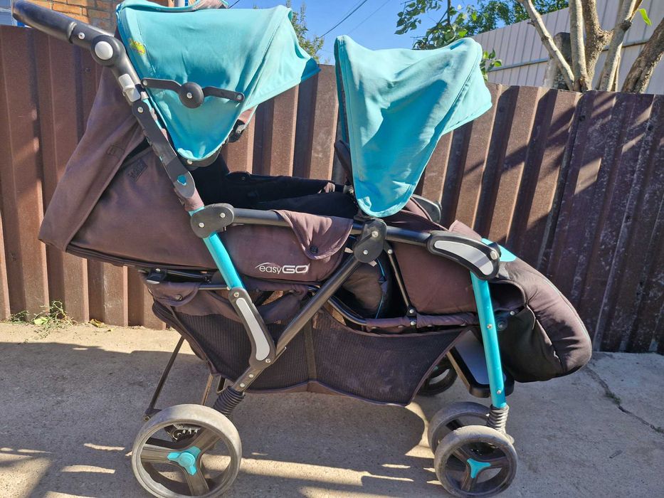 Коляска для погодок