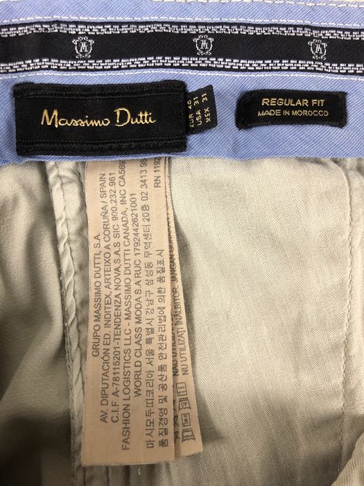 Kremowe chlopiece eleganckie spodnie chinosy Massimo Dutti
