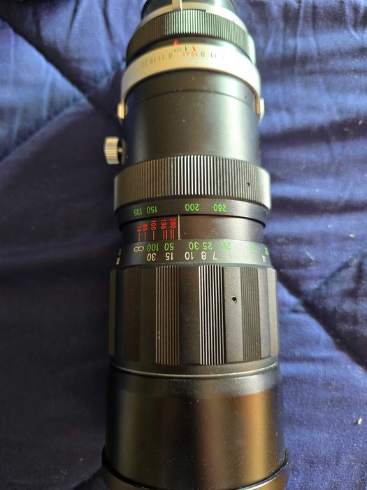 Máquina fotográfica Minolta + teleobjectiva