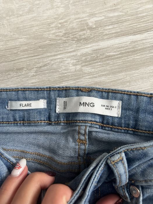 Джинси в кльош жіночі