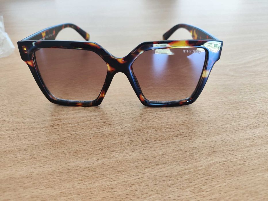 Oculos de Sol MIU MIU