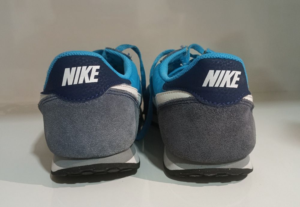 Nike Genicco - Homem 44
