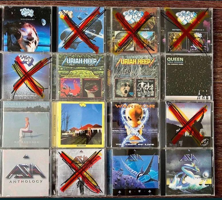 CD диски. Queen. Azia. UFO. Eloy. Uriah Heep. Dolores Oriordan. Warrior.