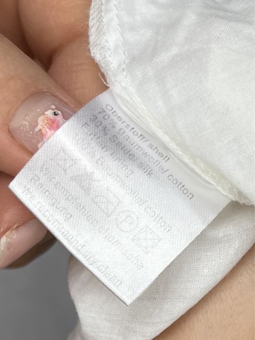 Biała rozkloszowana ażurowa długa maxi sukienka malvin